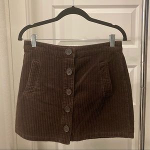 medium brown skirt with buttons and pockets